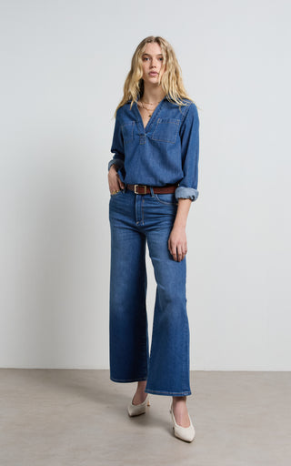 Women wearing a high waisted wide leg cropped jeans in Pacific blue denim
