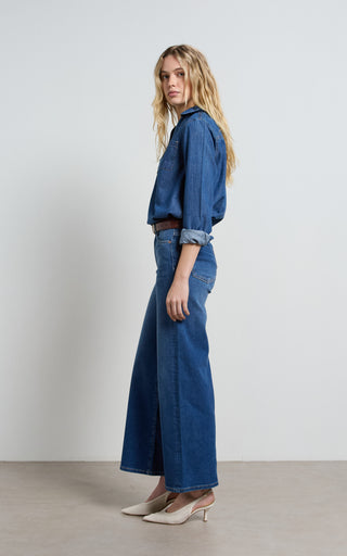 Women wearing a high waisted wide leg cropped jeans in Pacific blue denim