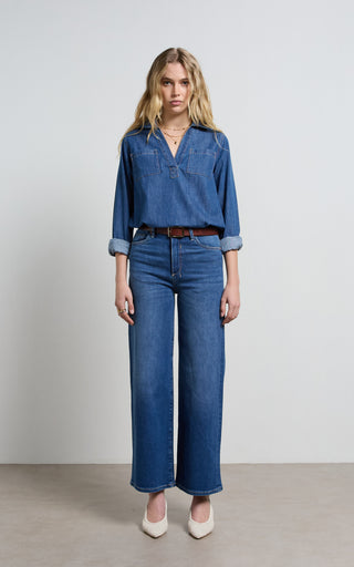 Women wearing a high waisted wide leg cropped jeans in Pacific blue denim