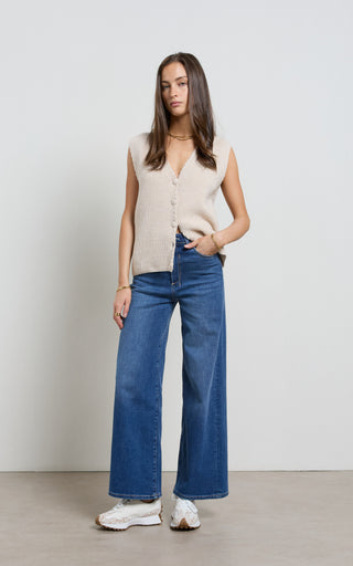Women wearing a high waisted wide leg cropped jeans in Pacific blue denim