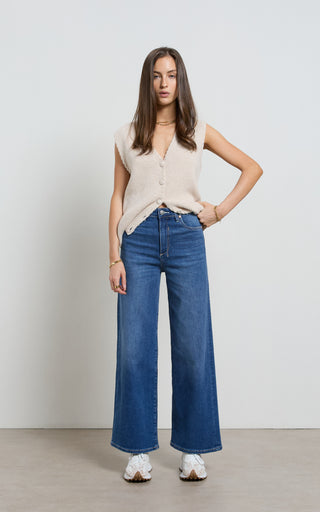 Women wearing a high waisted wide leg cropped jeans in Pacific blue denim