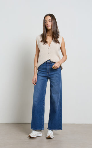 Women wearing a high waisted wide leg cropped jeans in Pacific blue denim