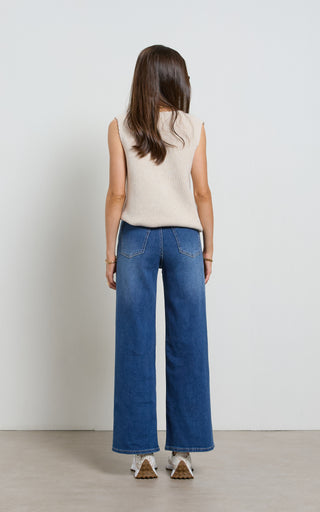Women wearing a high waisted wide leg cropped jeans in Pacific blue denim