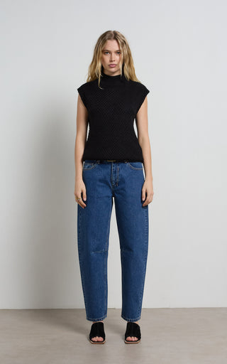 Chloe denim barrel jeans showcasing stylish design and comfortable fit for modern fashion trends.