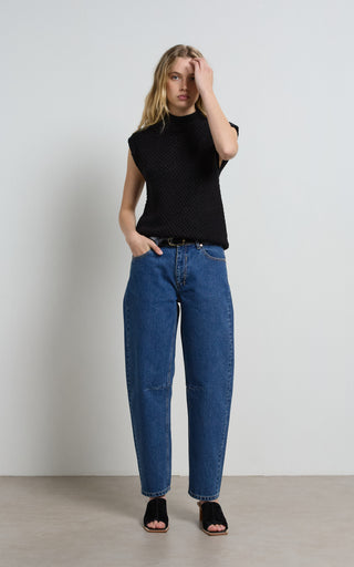 Chloe denim barrel jeans showcasing stylish design and comfortable fit for modern fashion trends.
