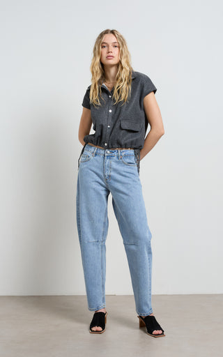 Mid rise barrel jeans offering stylish comfort and versatile fashion for modern wardrobes.