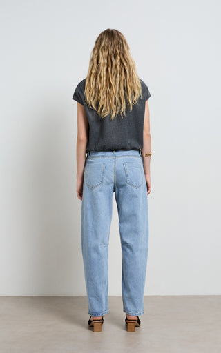 Mid rise barrel jeans offering stylish comfort and versatile fashion for modern wardrobes.