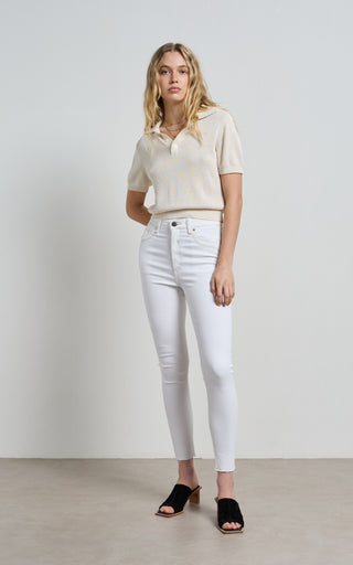 High waisted white skinny jeans for a sleek and stylish look, perfect for modern fashion trends.