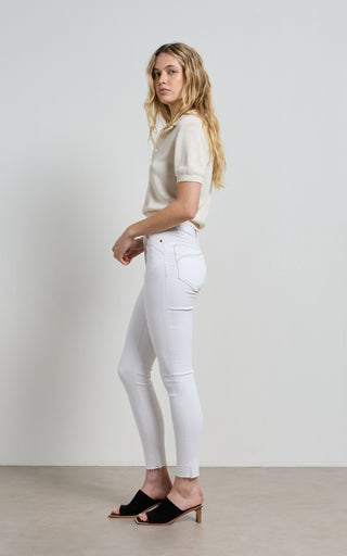 High waisted white skinny jeans for a sleek and stylish look, perfect for modern fashion trends.