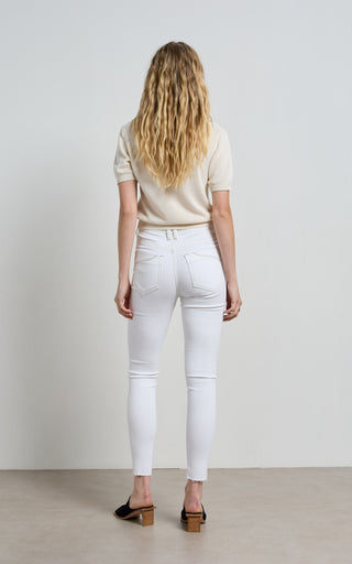High waisted white skinny jeans for a sleek and stylish look, perfect for modern fashion trends.