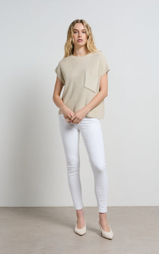 Mid rise white jeans perfectly tailored for a stylish and comfortable fit, ideal for versatile wardrobe options.