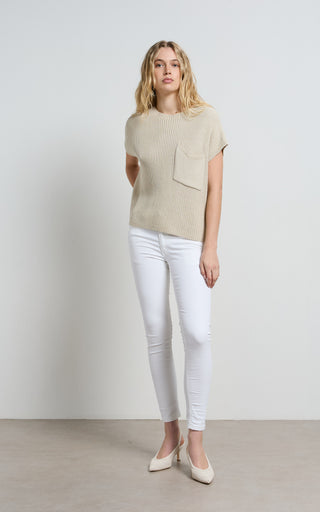 Mid rise white jeans perfectly tailored for a stylish and comfortable fit, ideal for versatile wardrobe options.