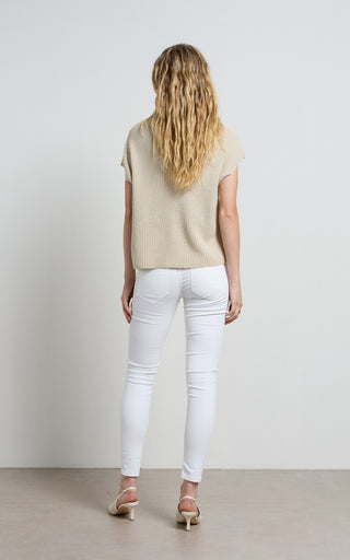 Mid rise white jeans perfectly tailored for a stylish and comfortable fit, ideal for versatile wardrobe options.