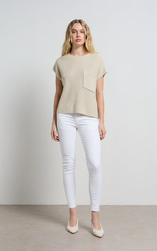 Mid rise white jeans perfectly tailored for a stylish and comfortable fit, ideal for versatile wardrobe options.